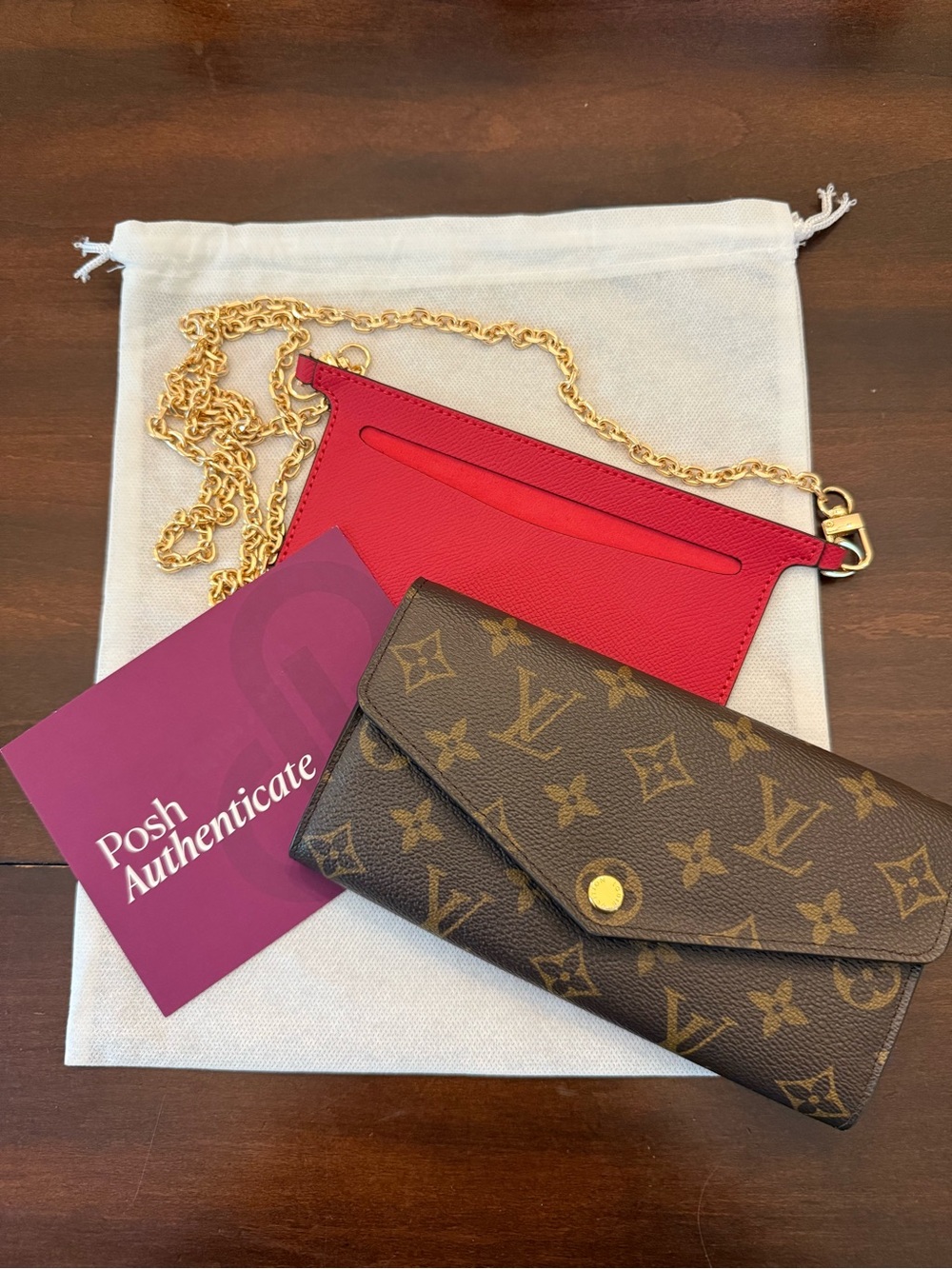Louis Vuitton Monogram Canvas Clutch with Red Leather and Gold Chain